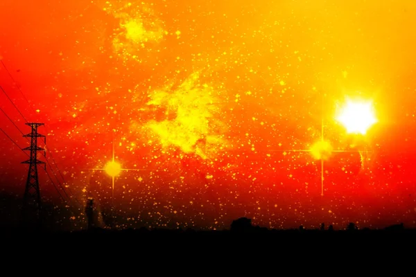 Potencia de alto voltaje en medio de un campo de maíz con cielo naranja y galaxia — Foto de Stock