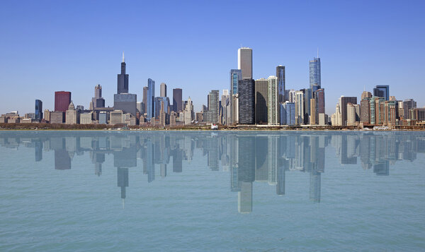 Chicago city skyline with building reflection on the lake