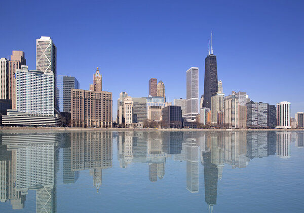 Skyline of Chicago city with buildings reflection on the lake