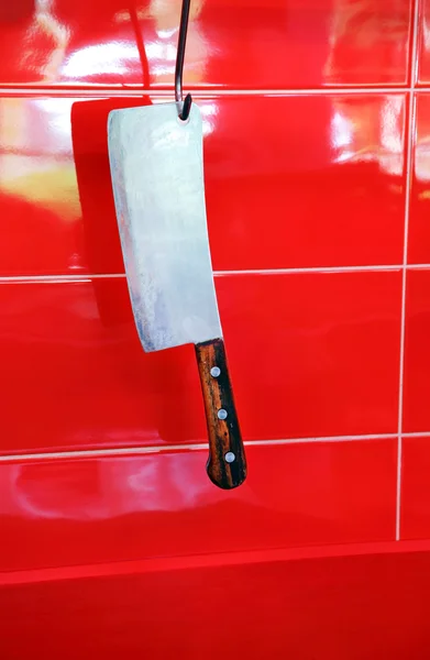 Meat cutter on the wall — Stock Photo, Image