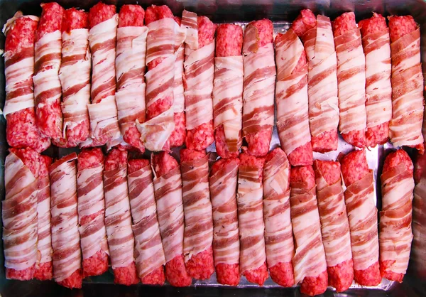Kebabs con tocino Imagen de archivo