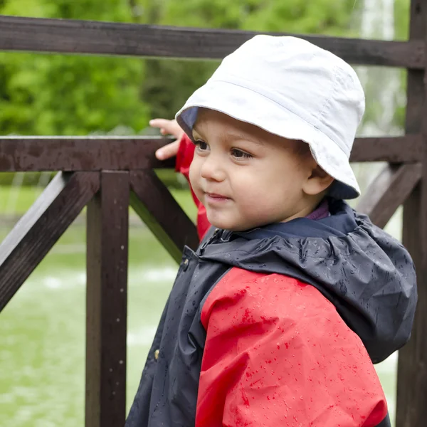 Child in rain — Stock Photo, Image