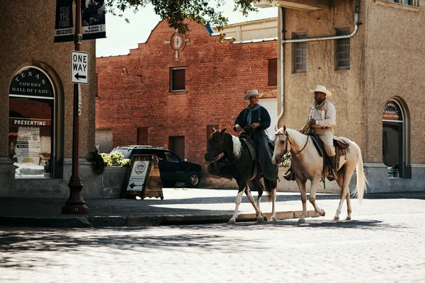 FORT WORTH, TX, USA - SEPTEMBER 24: Cowboys in the Fort Worth Stockyards historic district. September 24, 2013 in Fort Worth, Texas, USA