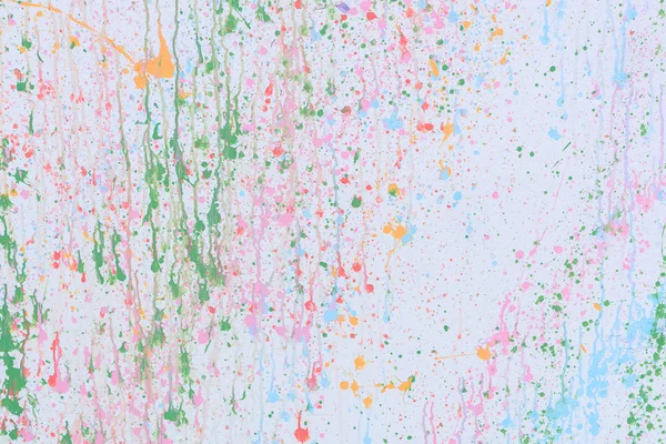 Kleur splash op wit papier textuur abstracte achtergrond. — Stockfoto