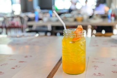 Thai herbs, dried bael, bael juice with ice in a glass of cold s