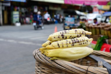 Boiled corn selling at street market in Thailand.