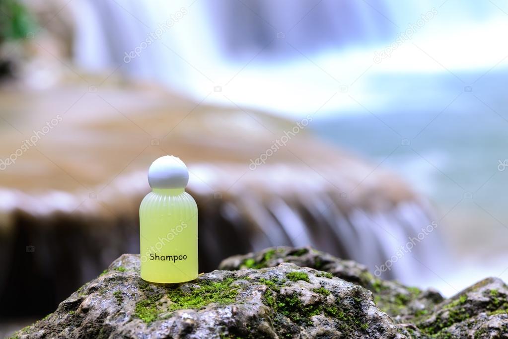 Spa shampoo on waterfall background.