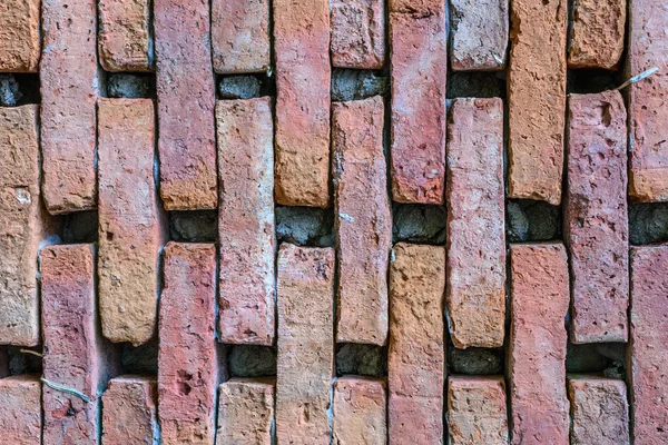 Intemperie macchiato vecchio sfondo muro di mattoni. — Foto Stock