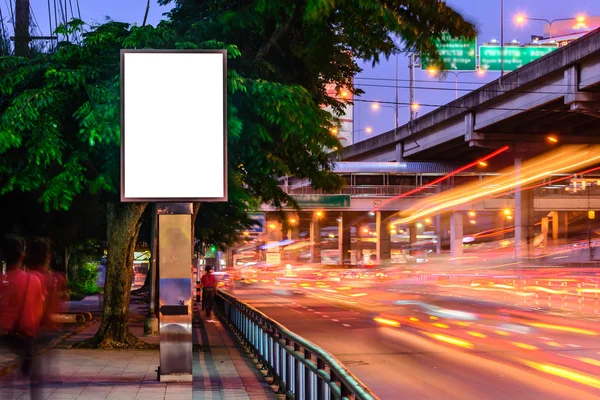Blank advertising panel near road at night. — Stock Photo, Image