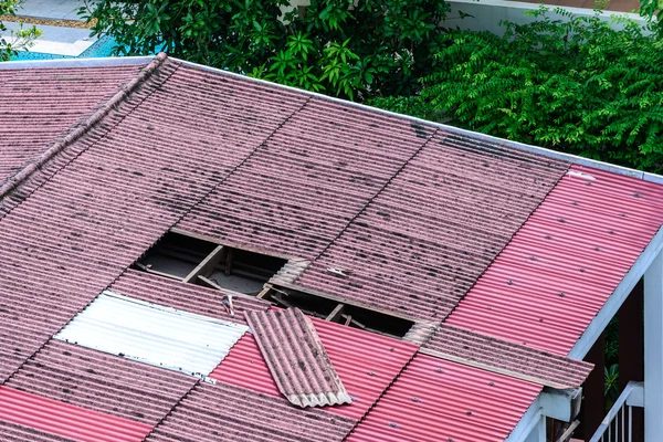 Damaged old tiles roof, need to replacement. — Stock Photo, Image