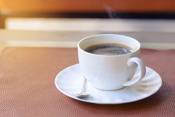 Hot americano, Black coffee in white cup on wooden table. — Stock Photo, Image