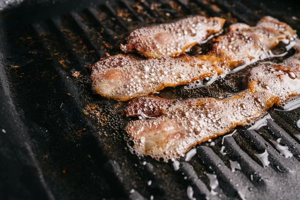 Close Frying Sizzling Bacon Strips Pan Hot Greasing Bacon Oil — Stock Photo, Image
