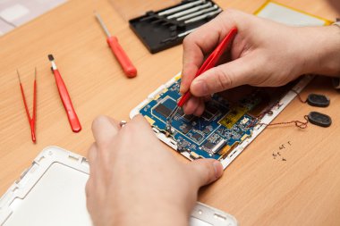 Ana onarım tablet Pc. eller bir üst görüntüleme.