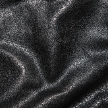 Siyah deri kıvrımları arka planda