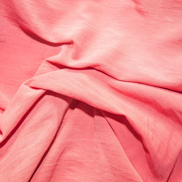 Red fabric. Background in the folds. — Stock Photo, Image