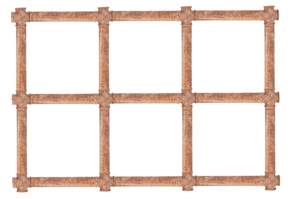 Gitter aus rostigen Rohren. isoliert auf weißem Hintergrund — Stockfoto