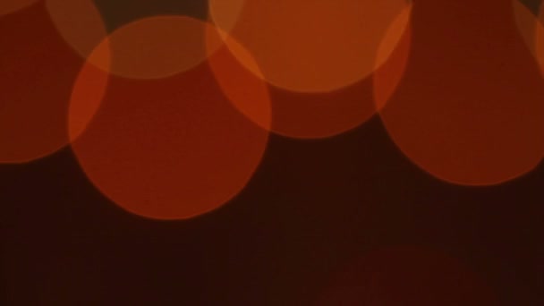 clignotant cercles multicolores. guirlande fond flou 