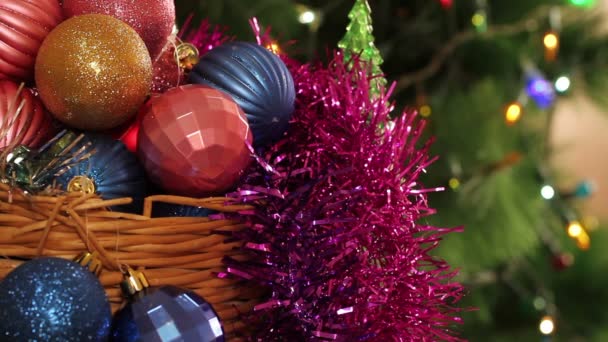 Christmas balls and fir tree with garland flashing. Background — Stock Video