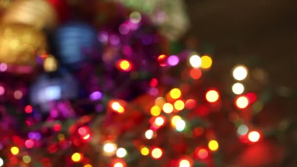 Abstracte achtergrond van de kerst. knipperende garland — Stockvideo