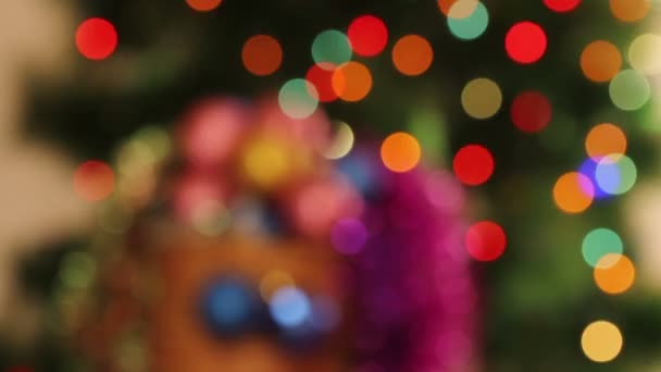 Fondo abstracto de Navidad. Luces borrosas Guirnaldas de árbol de Navidad — Vídeos de Stock