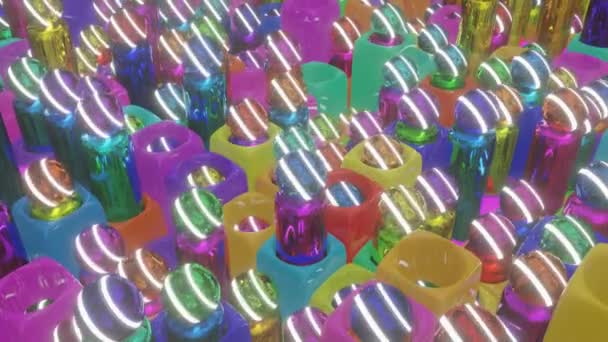 シリンダー上の多色の球体をゆっくりと回転させ 穴のある三次元の立方体に落下させます アニメーションの背景を見ました 3Dレンダリング — ストック動画