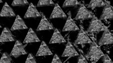 Çatlamış desenli siyah beyaz piramitler. Döngülü hareketli arka plan. 3d hazırlayıcı