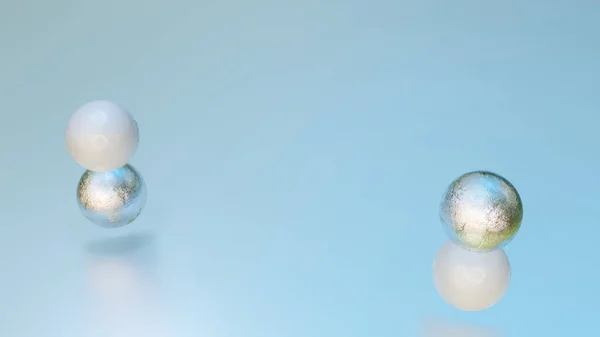 white and silver spheres one on top of the other. abstract composition. 3d render illustration