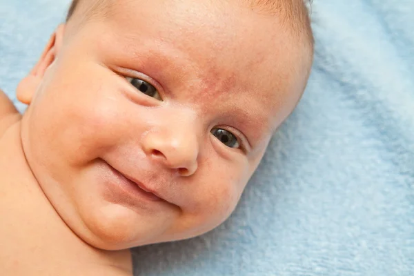 Baby with towel — Stock Photo, Image