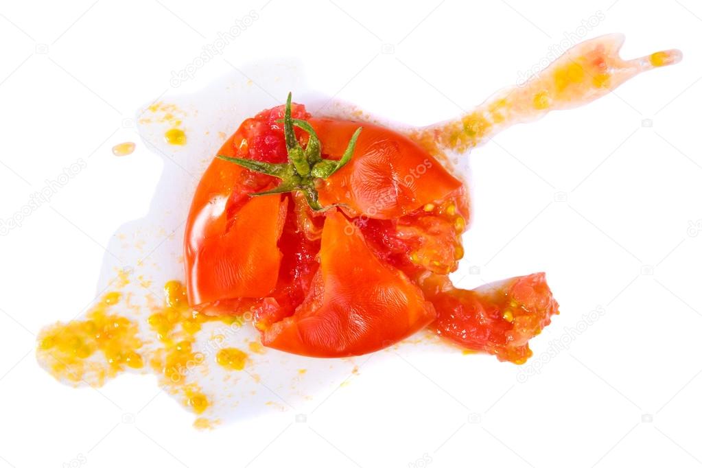 crushed tomatoes isolated on white background