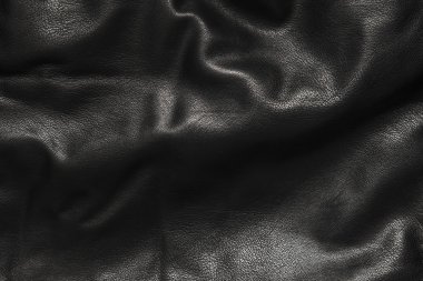 Siyah deri kıvrımları arka planda