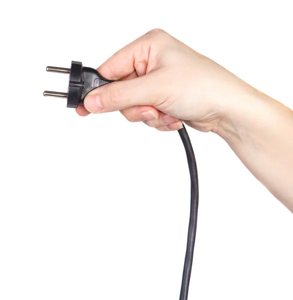 Cable with a plug in a female hand on a white background — Stock Photo, Image