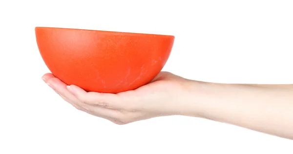 Orange Bowl op een vrouwelijke hand op een witte achtergrond — Stockfoto