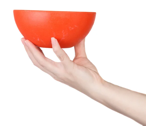 Orange Bowl op een vrouwelijke hand op een witte achtergrond — Stockfoto