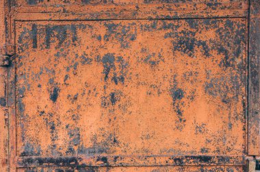 Soyut metal doku arka planı. Paslı eski yüzey ve kahverengiyle kirlenmiş.