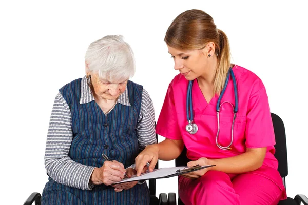 Senior woman at the doctor — Stock Photo, Image