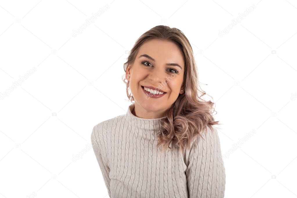 Beautiful caucasian woman wearing beige knitted blouse is smiling to the camera on isolated