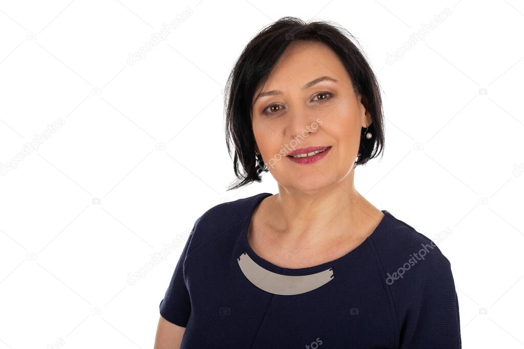 Portrait of beautiful middle aged woman posing on isolated background