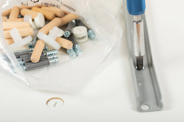 Close up picture of carpenter tools for furniture assembling at home