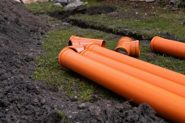 Lägga Ner Orange Pvc Dräneringsrör Marken — Stockfoto