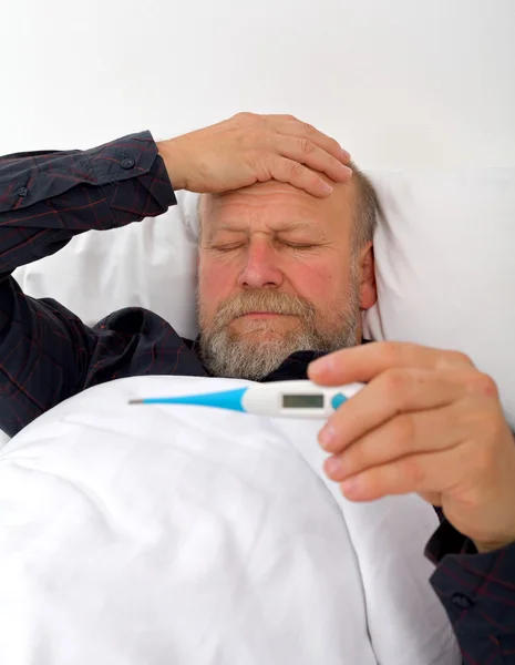 Unwell elderly man — Stock Photo, Image