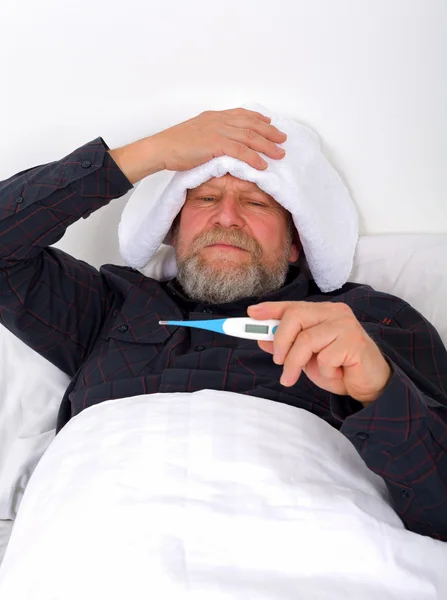 Unwell elderly man — Stock Photo, Image