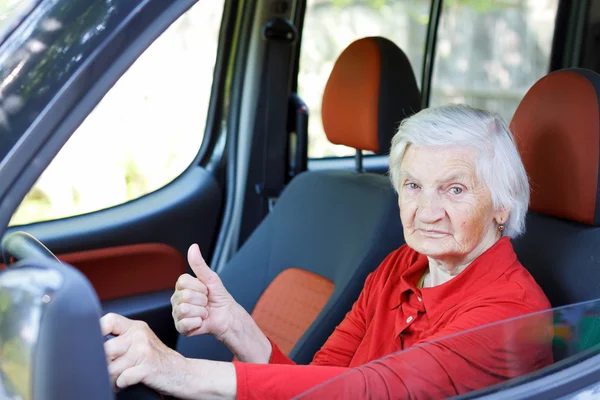 Senior woman driving — Stock Photo, Image