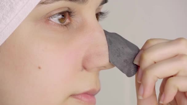 Woman Removes Cleansing Strip Her Nose Black Dots Nose Girl — Stock Video