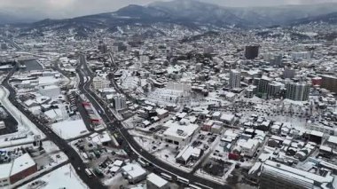 4K Hava Aracı kar manzaralı Otaru şehri, Hokkaido, Japonya