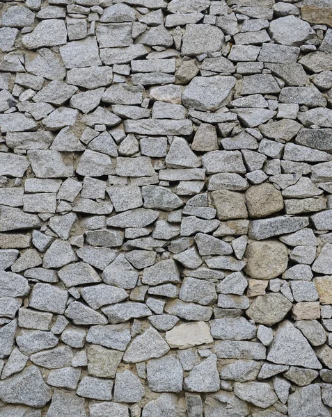 Piedra apilada pared textura — Foto de Stock