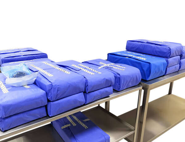 Wrapped Sterile Surgical Instruments Sets In Table