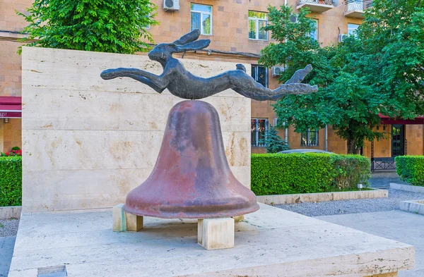 Jump over the bell — Stock Photo, Image