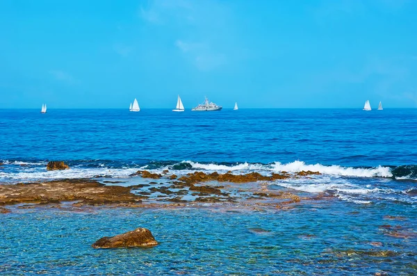 Walk the coast of Kolpos Chanion (Chania Bay) of Cretan Sea and watch yachts regatta, Crete, Greece