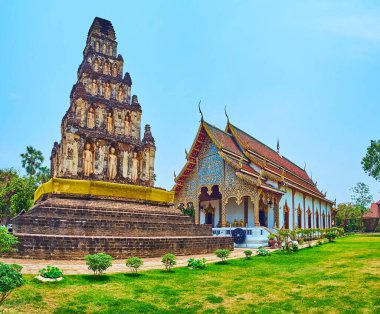 Suwan Chedi Jungkote ve Wat Chammathewi, Lamphun, Tayland 'ın süslü Viharn salonu.