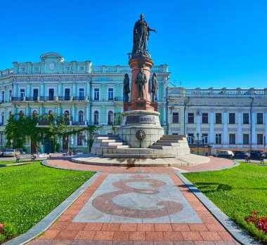 The monument to Odessa Founders, topped with statue of Catherine the Great, located in Ekaterininskaya Square (Catherine's Square), with monogram E of Catherine II in the foreground, Ukraine clipart